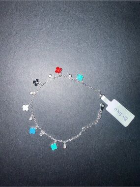 Silver Charm Bracelet with Red, Black, White & Turquoise Clover Charms